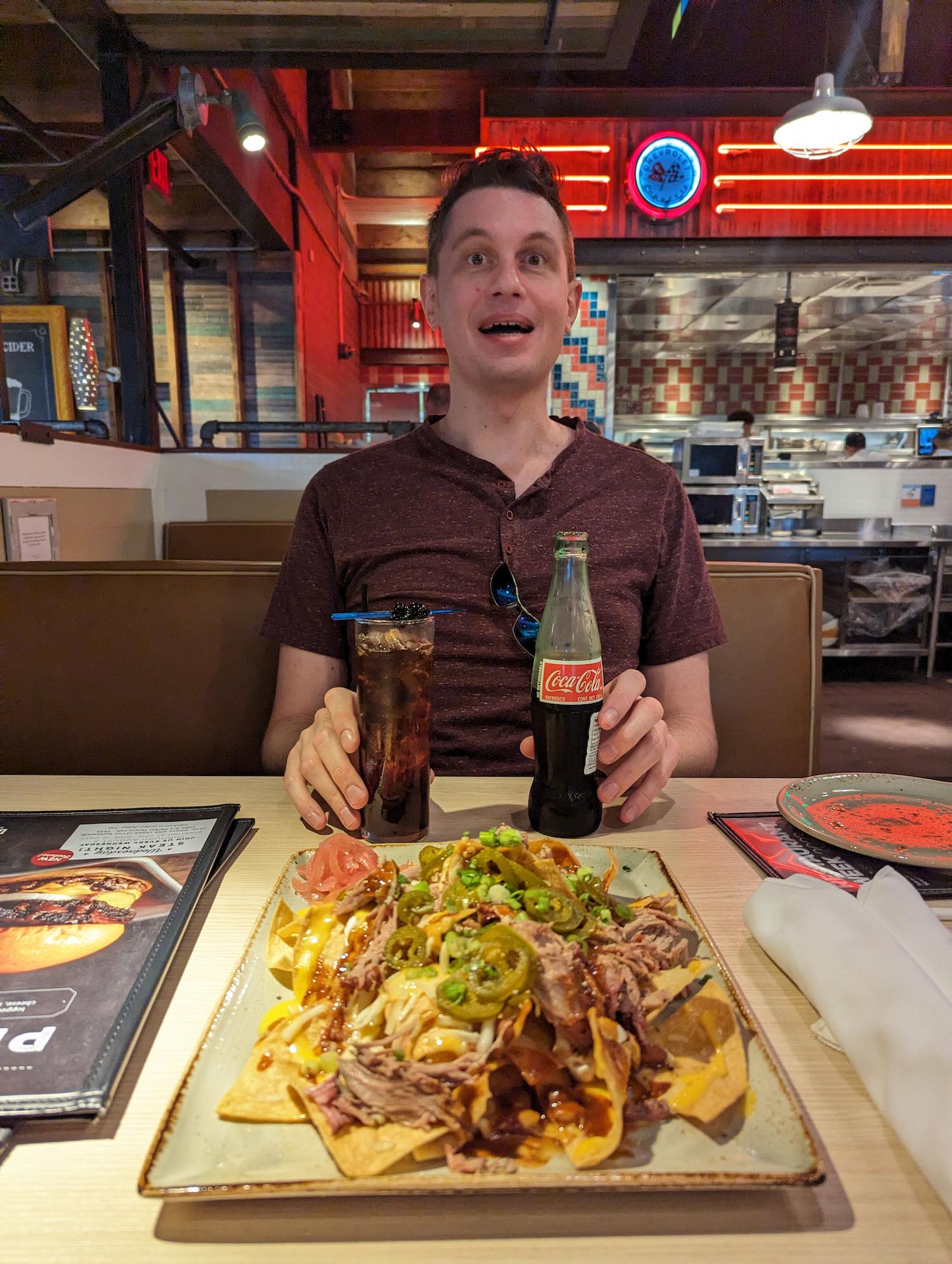 Devin with Nachoes and a coke